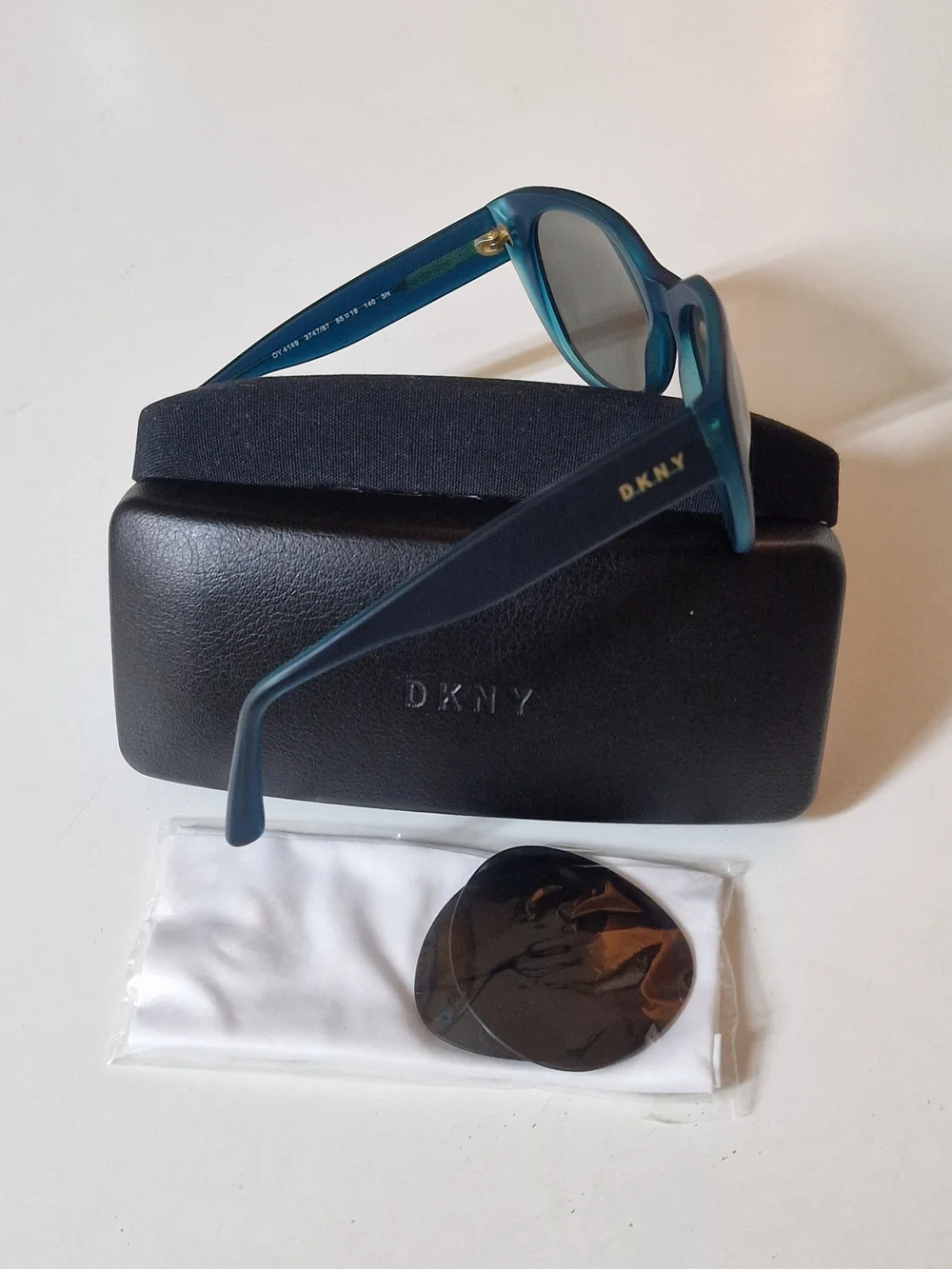 DKNY Teal Sunglasses with Gold Logo Accents